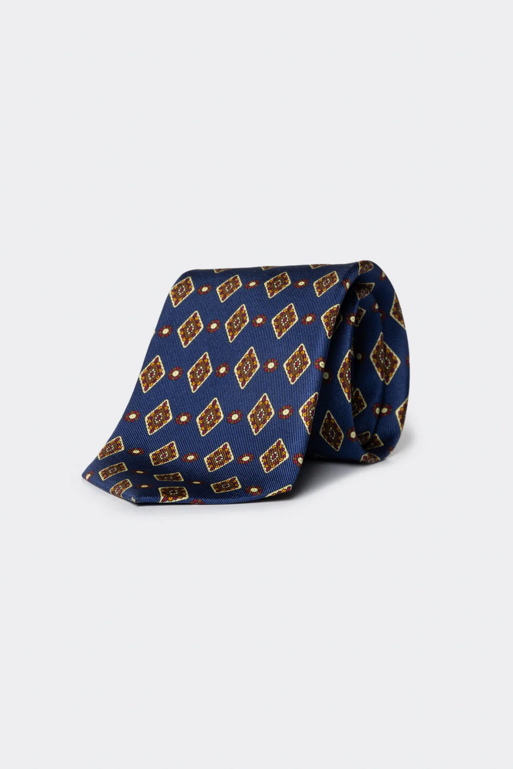 Cravatta con fantasia geometrica a rombi blu